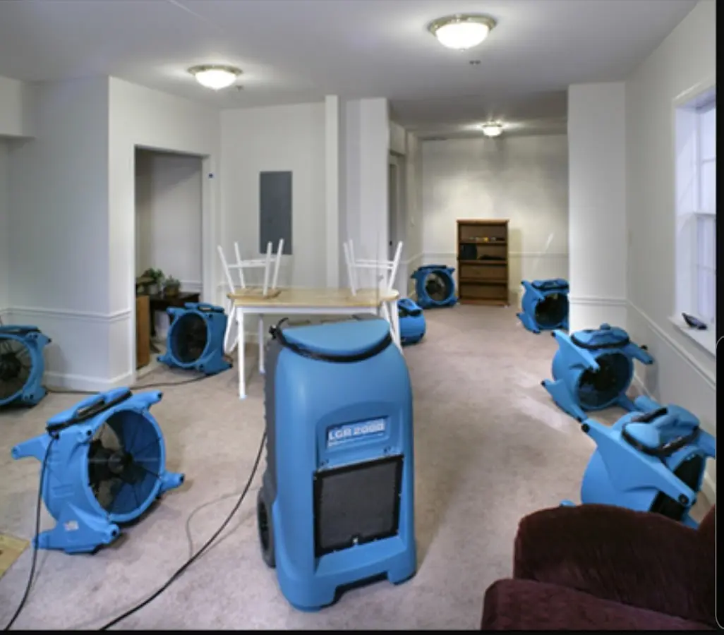 Air movers and dehumidifier setup for Water Damage Restoration in South Berwick